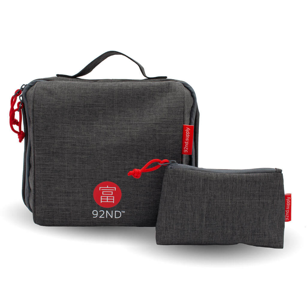 Gray toiletry bag with makeup pouch, for women. Plenty of space and compartments. Easy to hang.