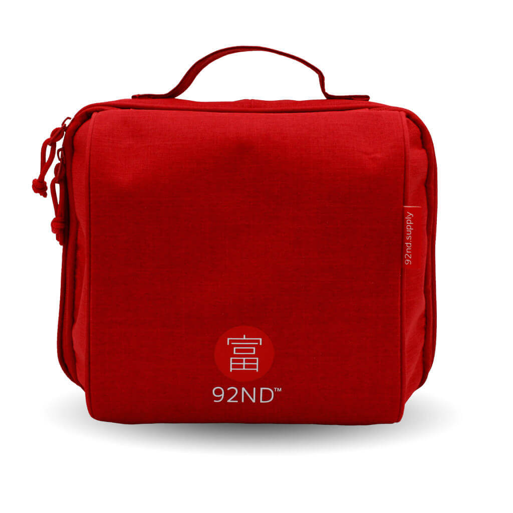 Red hanging toiletry bag. You're always well-organized and ready for any trip.