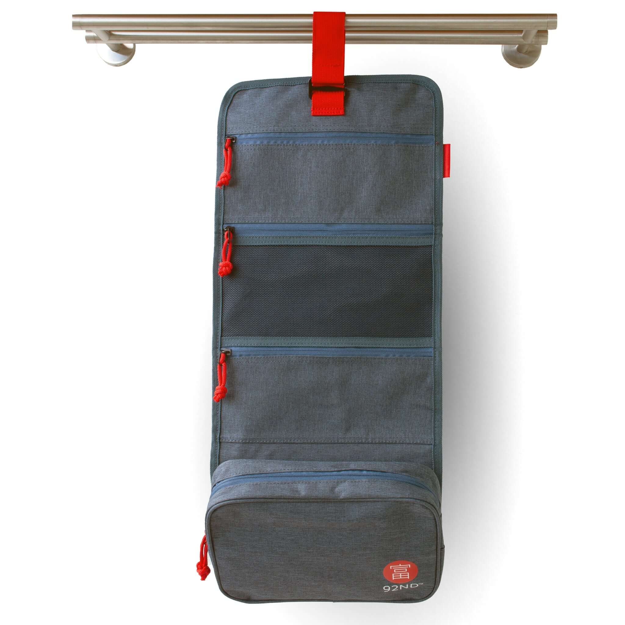 Hanging toiletry bag Washroll blue – hanging organizer with multiple compartments and red accents.