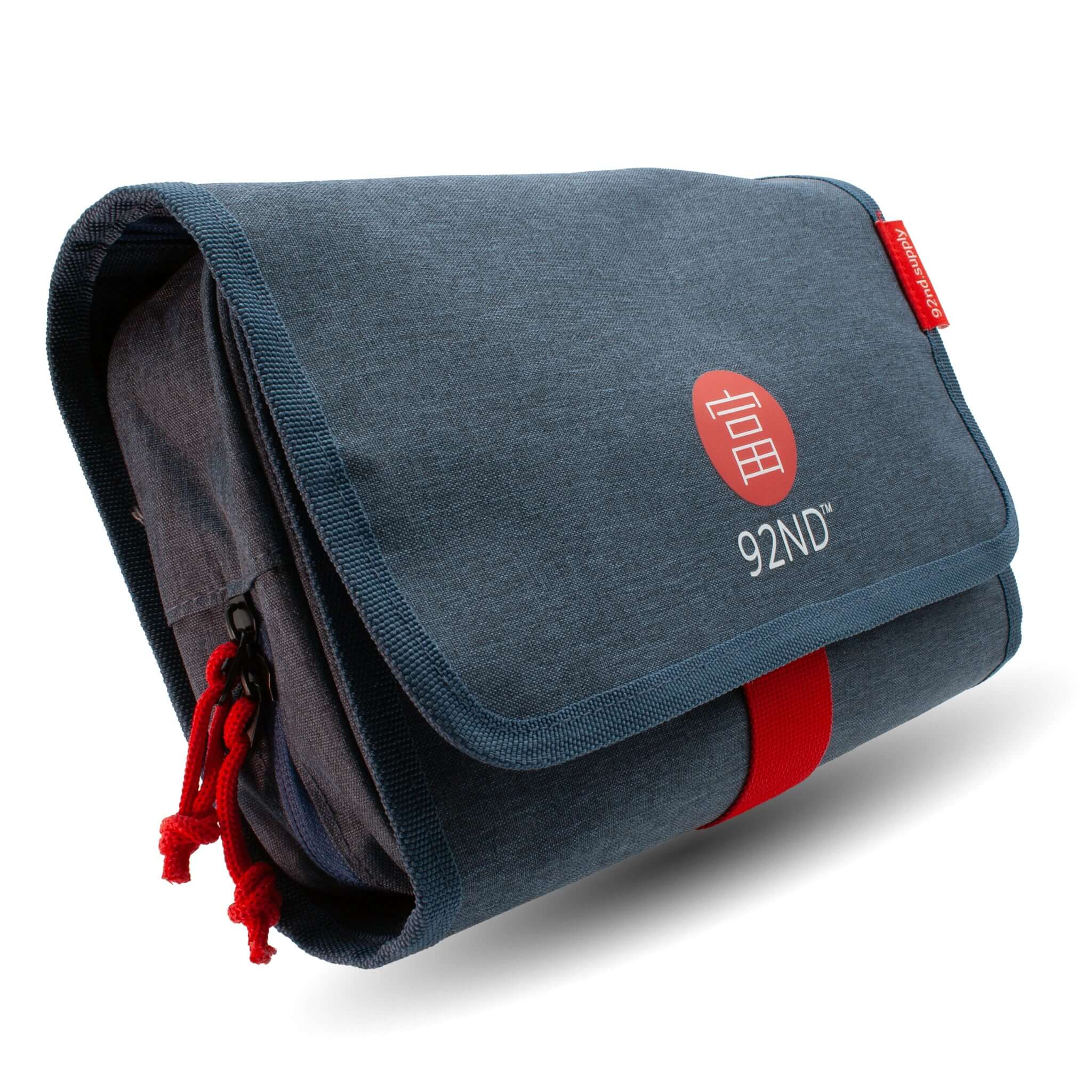 Hanging Toiletry Bag Washroll Blue unfolded with red details and logo for an organized overview.