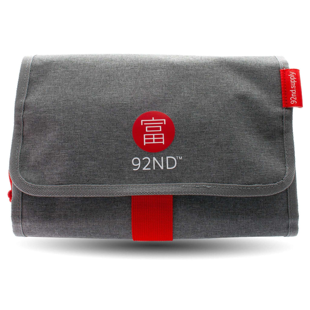 Hanging toiletry bag Washroll grey with red logo, foldable and ideal for hanging for overview and order.
