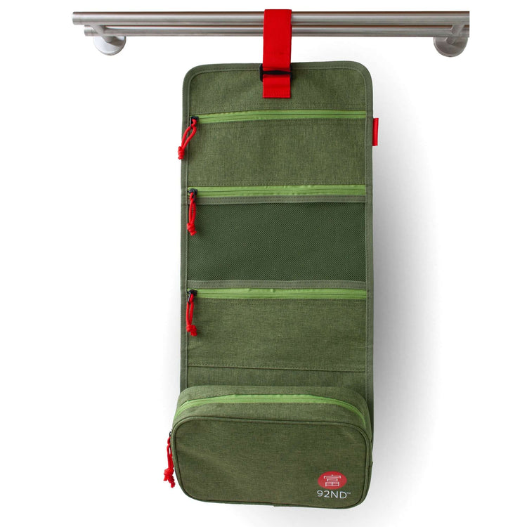 Hanging toiletry bag green on a rod with strap and loop – stays dry at the sink