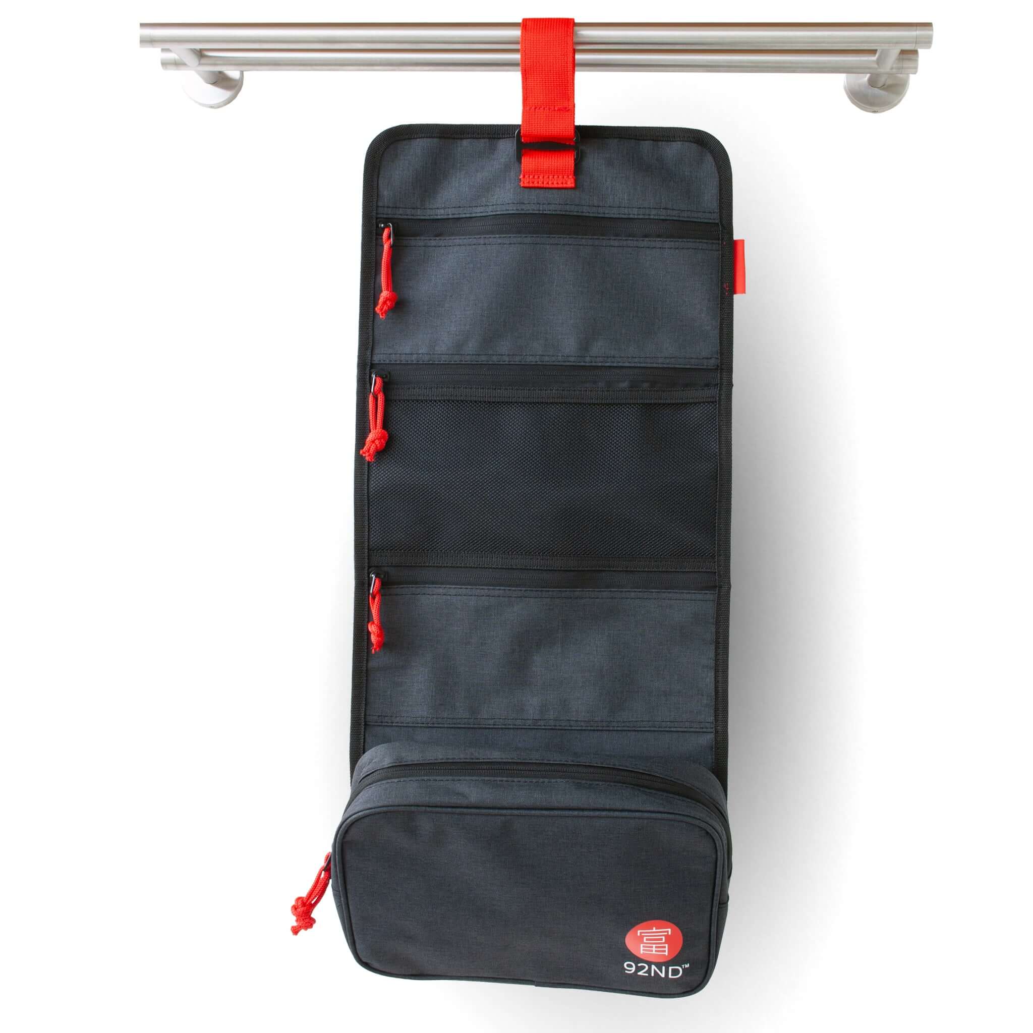 Hanging toiletry bag Washroll black – hanging organiser with multiple compartments and red accents.